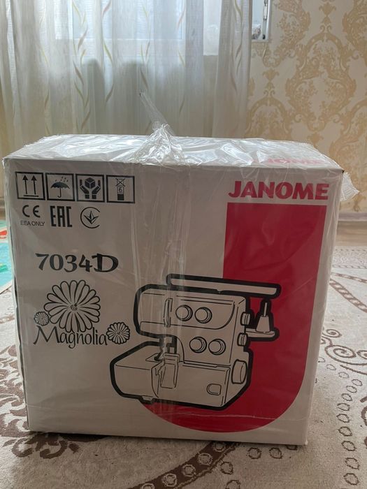 Оверлок Janome 7034 d.