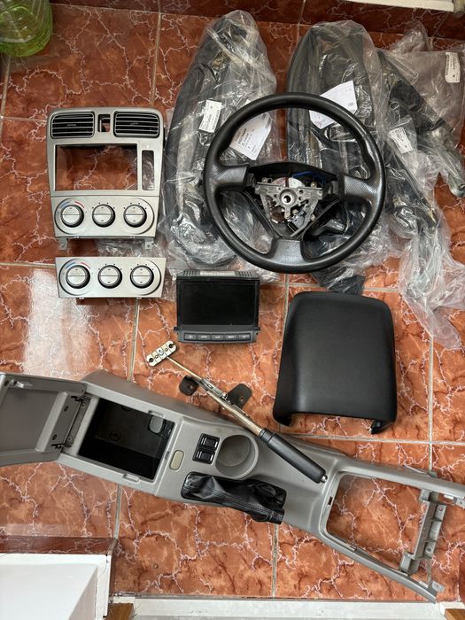 Subaru Forester SG 2002-2008 piese cocoasa navi volan cotiera chedere