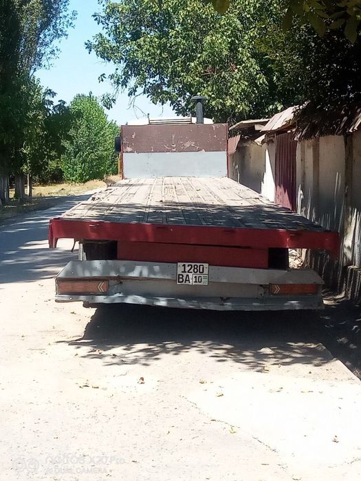 МАЗ автотягач срочна сотилади