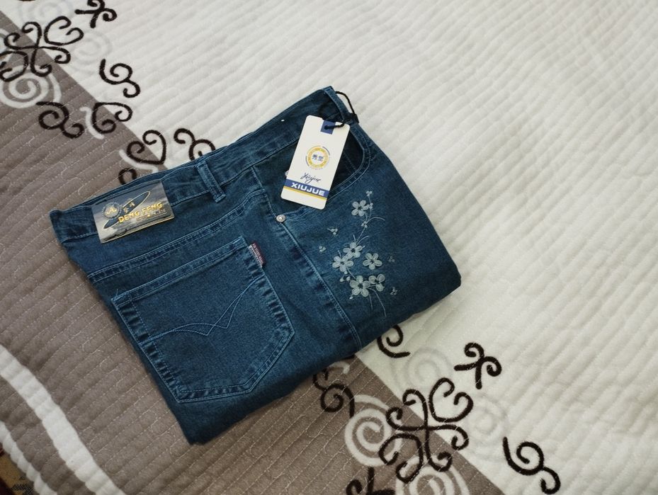 Джинсовые брюки новые клеш