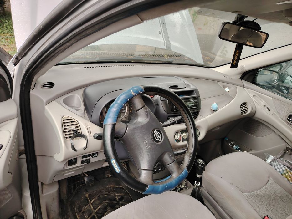 Нисан Алмера Тино