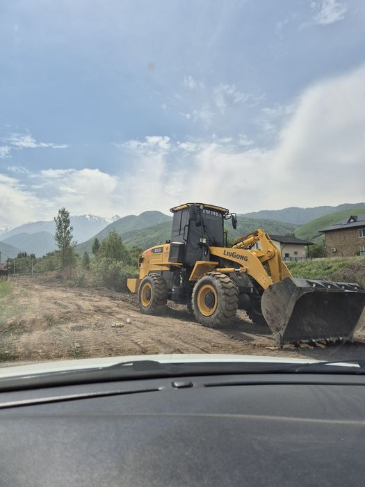 Услуги фронтального погрузчика