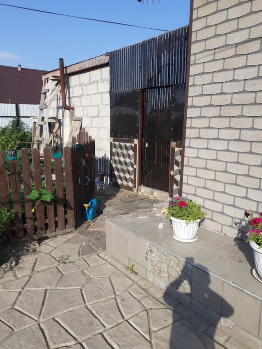 Продам 1/4 дома,село Белое
