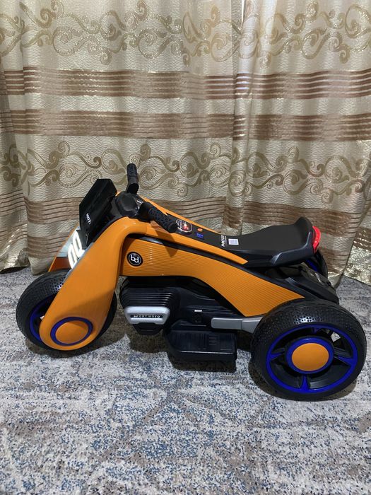 Bolalar elektr mototsikli (3 g'ildirakli) — Holati ideal!