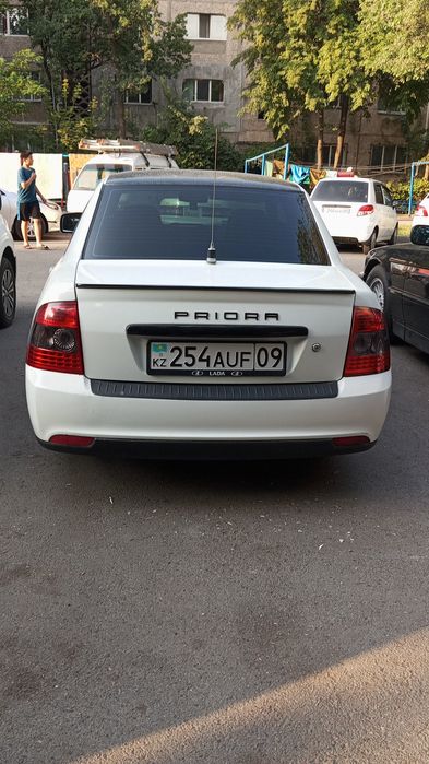 Приора полулюкс 2013 года