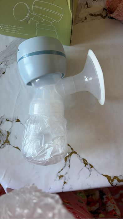 Продам молокоотсос электрический. Новый