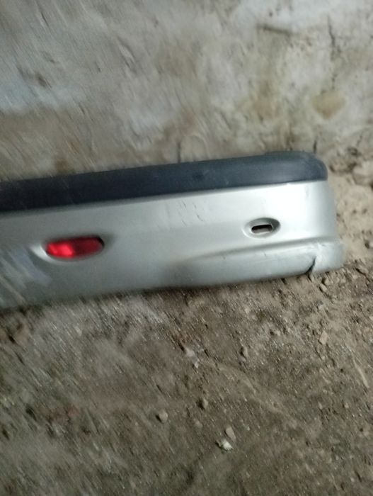 Бампер задний пежо 206