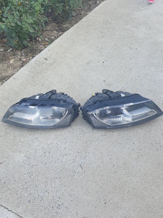 Vind 2 faruri audi a3 2010 pt masina cu volan pe dreapta