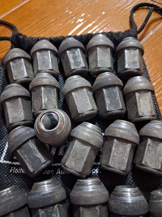 Set 20 piulțe originale ptr.Ford jante aliaj