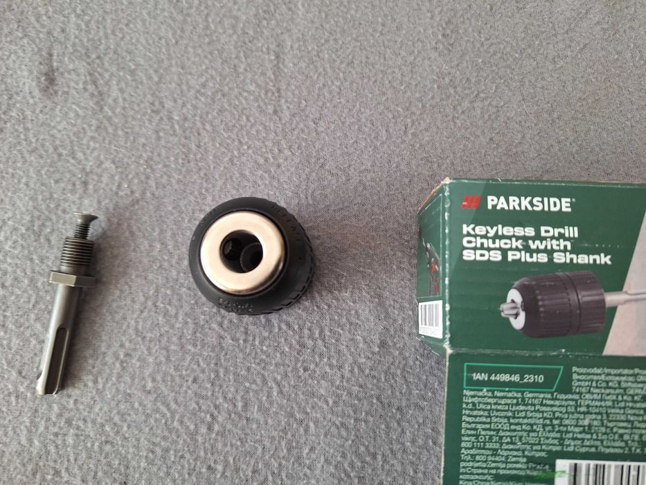 Mandrină rapidă fără cheie cu adaptor SDS Plus marca Parkside.