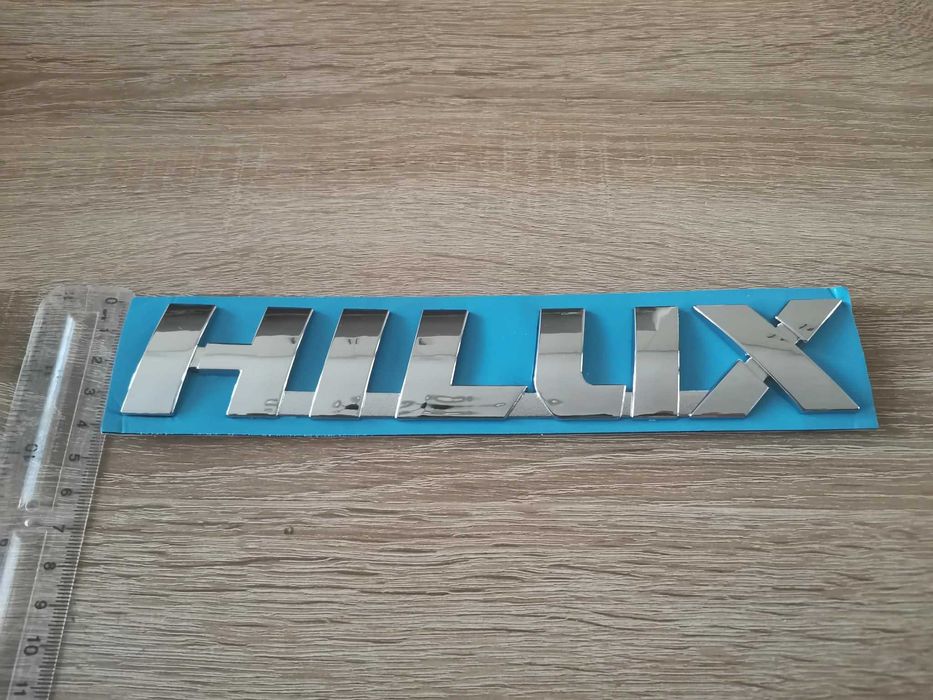 Toyota HILUX надпис лого 21 см