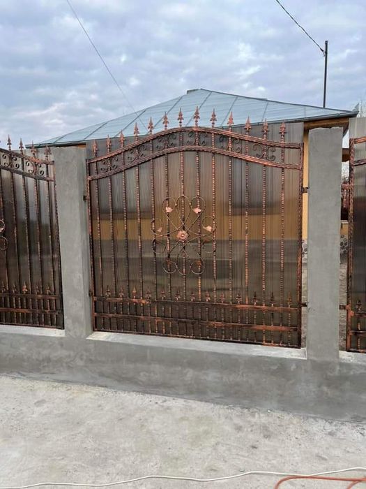 Porți și garduri din fier forjat