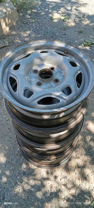Диски стальные 4/100 R14.Поперечные рейлинги