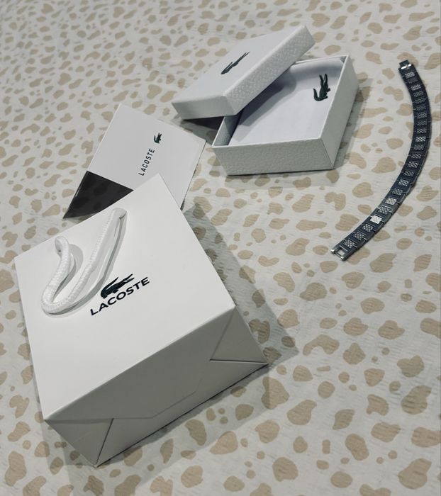 гривна   Lacoste