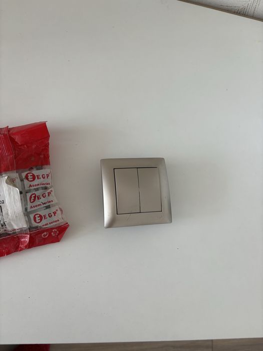 Выключатель серый матовый