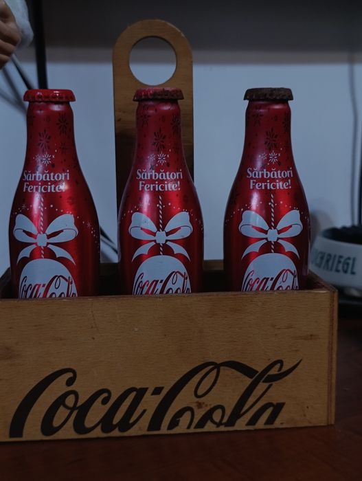 Ofertă Moș Crăciun cu sticlă de coca cola