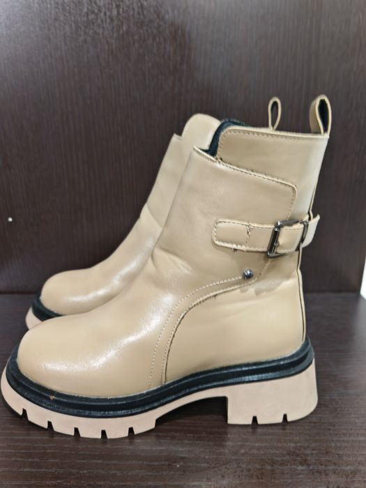 Продам новые зимние сапоги