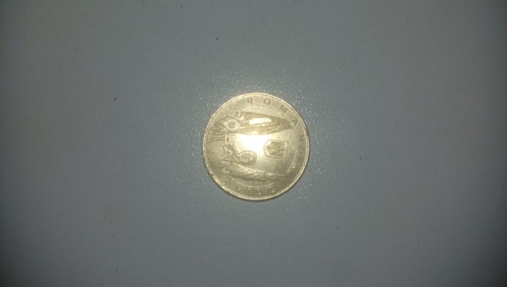 Vând monedă de 50 bani de la Revoluția României din Decembrie