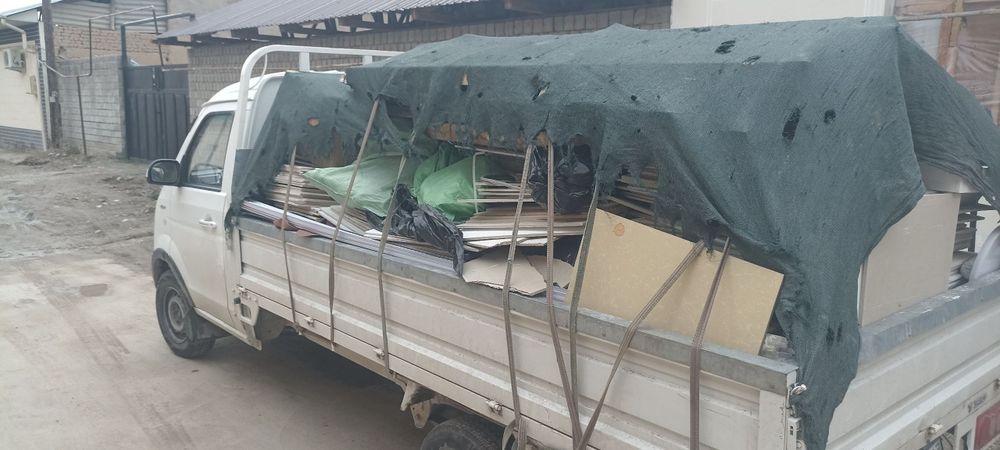 Вывоз мусир мусир хизмати хохлаган машена бор Исузи. Шенера ва Лабо