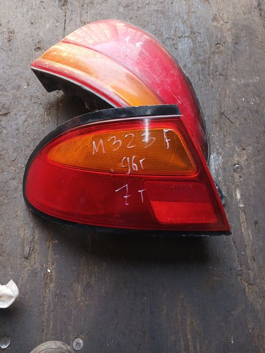 Фонарь Мазда 323F 1995г левый