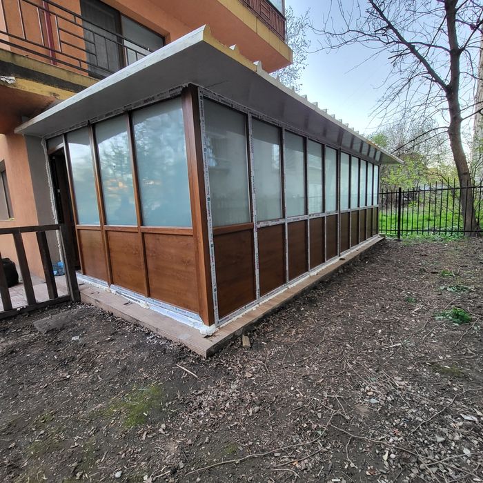 Termopane usi de garaj rulouri veranda balcon