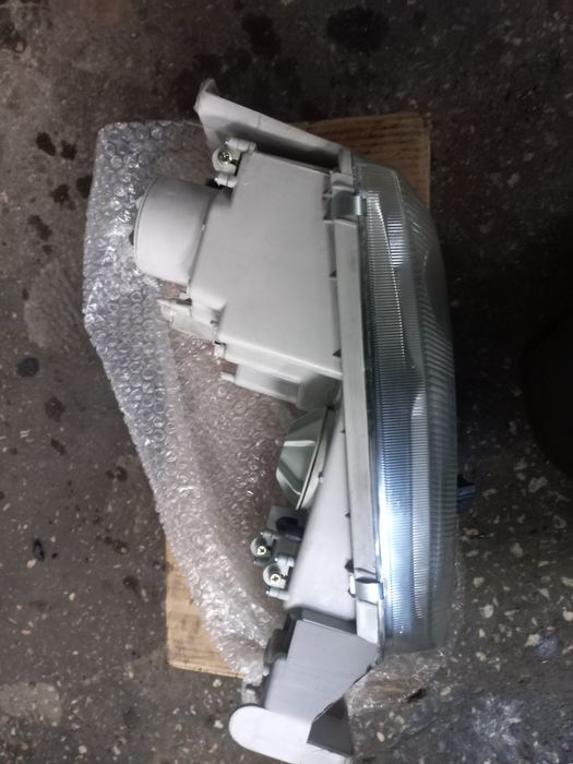 Фара мазда кронос левая