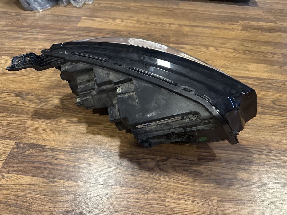Фара левая Geely Emgrand