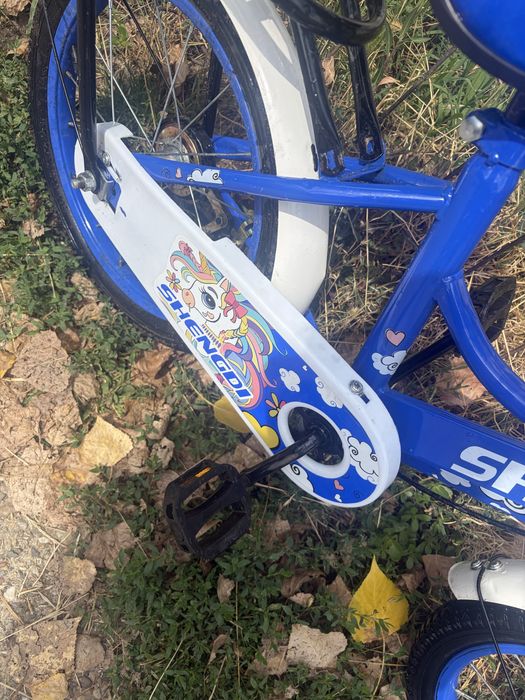 Vand bicicleta cu roti pe 14