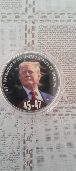 Продаётся монета с изображением Президента США
