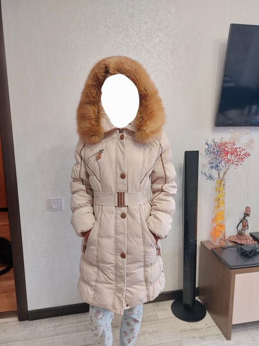 Продам пуховик теплый