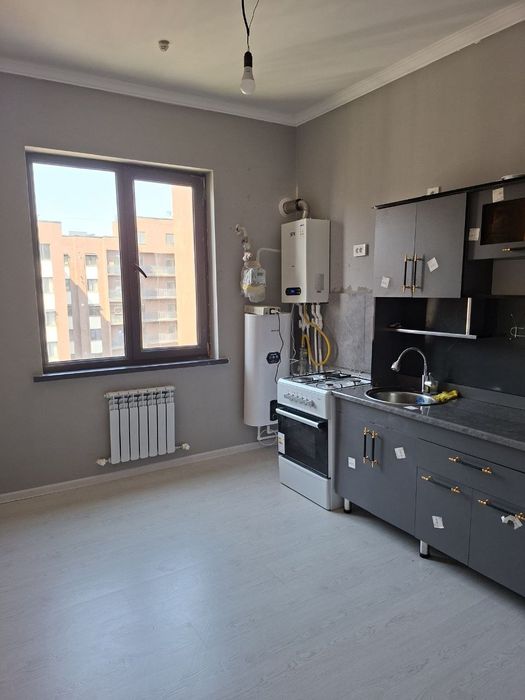 Kvartira oʻrikzor bozori yonidagi yangi domlardan 2 xonalik yangi remo