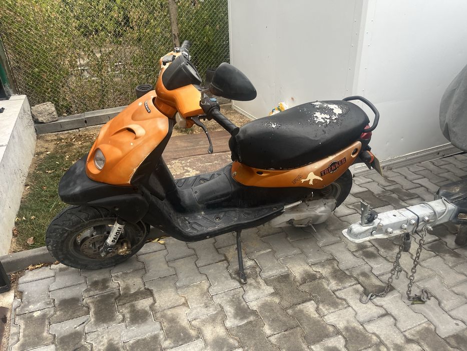 Скутер Пежо Тракер