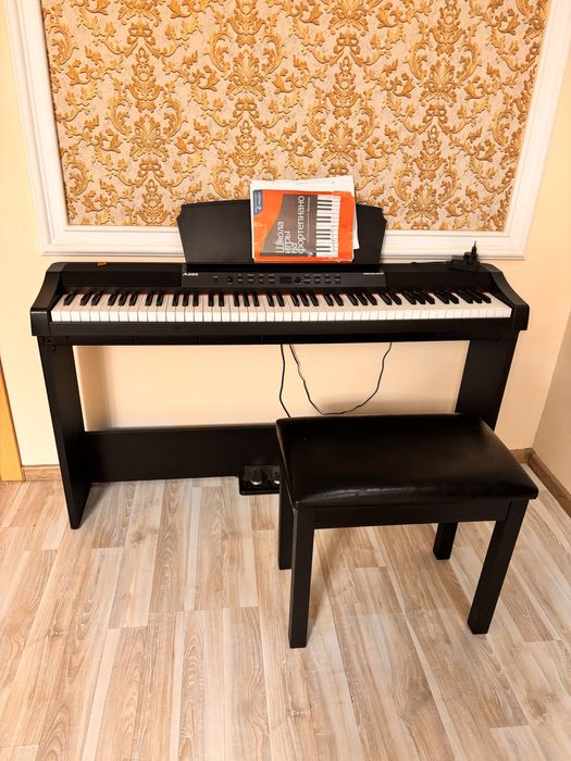 Продам электрическое фортепиано