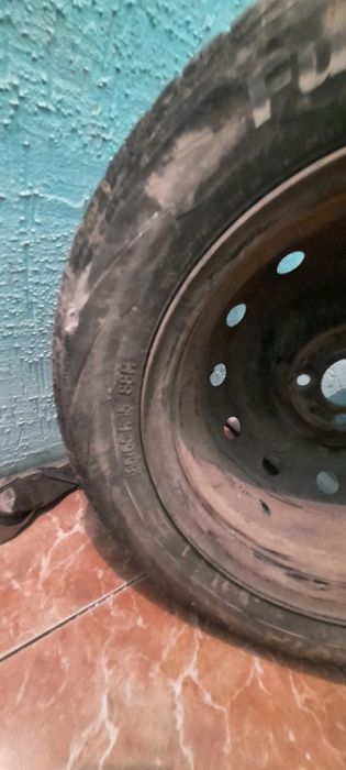 Покрышка с диском на 15