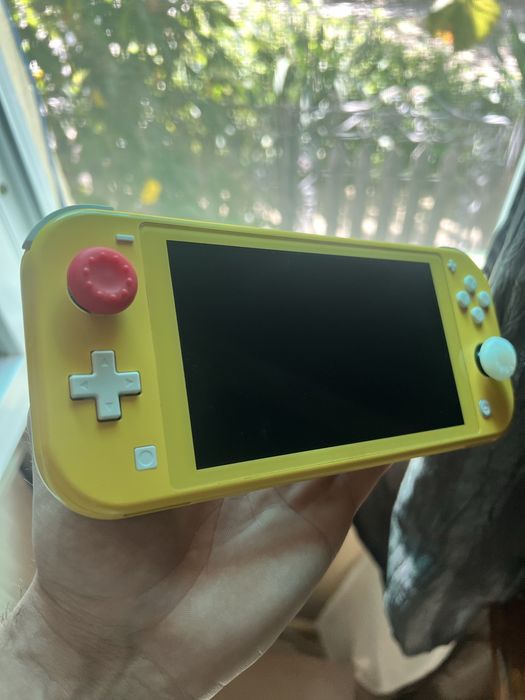 Consolă Nintendo Switch Lite la cutie + Minecraft include Super Mario mash-up