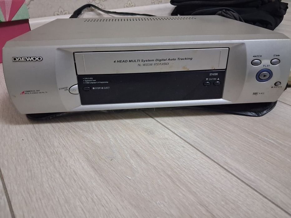 Видеокамера, фотоаппарат и видеоплеер