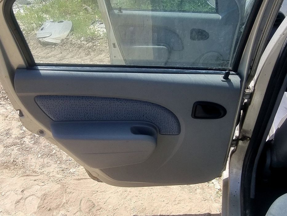 Tapiterie usa stanga spate Dacia Logan (LS) [Fabr 2004-2012] 1.6 B K7M