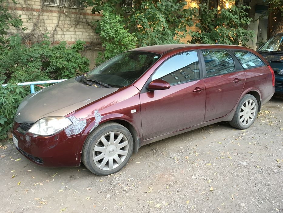 Nissan primera p12 2003 год