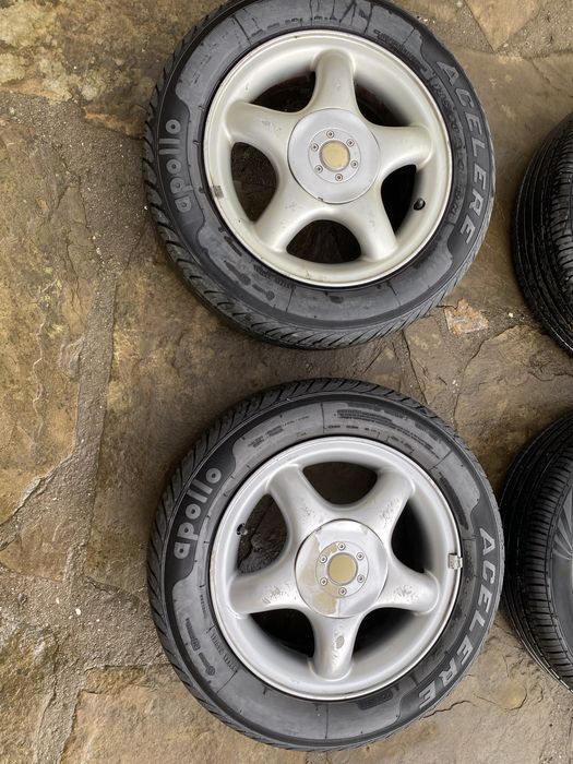 Продавам 4 алуминиеви джанти с летни гуми с размер 185/60 R 14 82 H