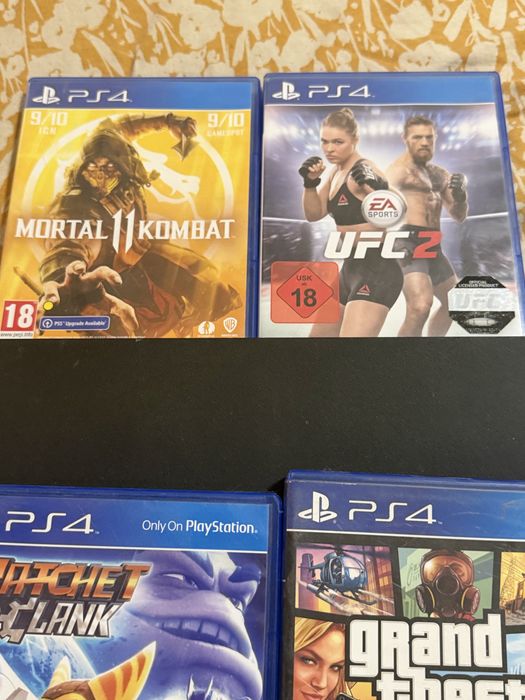 PlayStation 4 Slim 500 GB + 10 jocuri – fără manetă