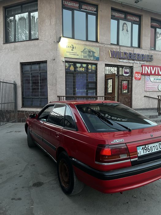 Мазда 626.
