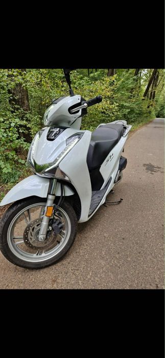 Honda sh 125 injectie