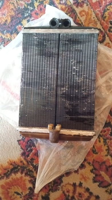 Радиатор печки Мерседес С202