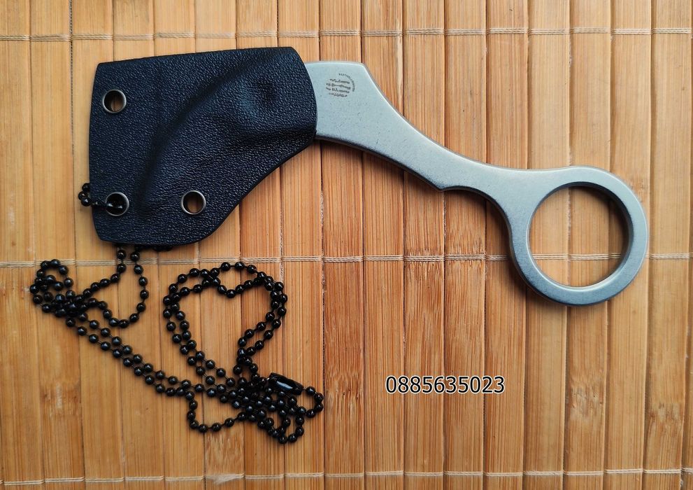 Карамбит с фиксирано острие