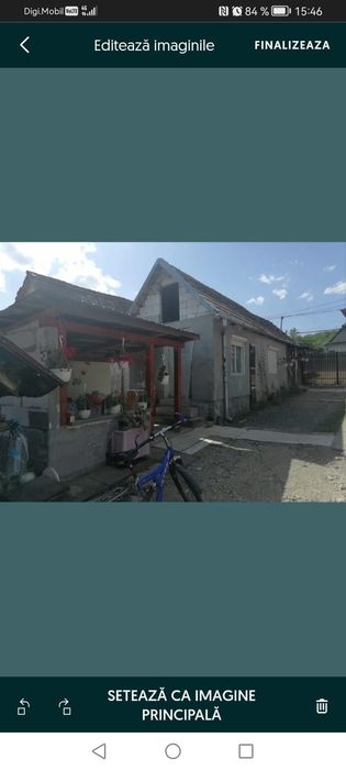 Casa la curte de vanzare