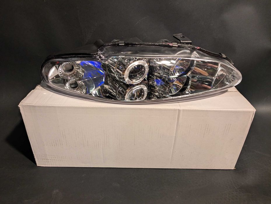 Faruri Mitsubishi Eclipse noi