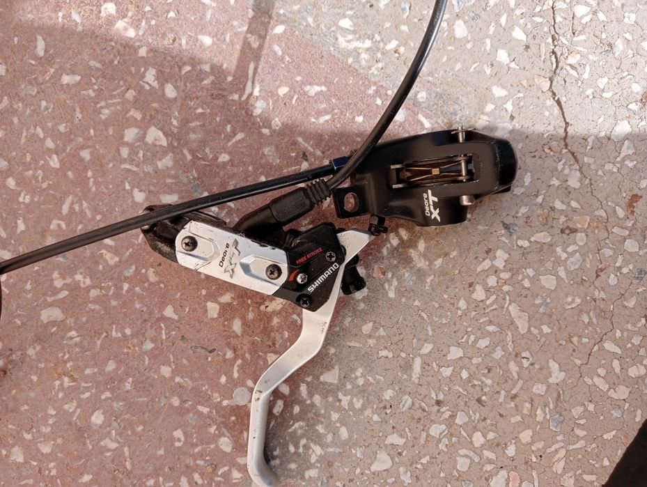 Frână disc hidraulica Tektro Shimano Deore XT pe jantă Magura Deore V