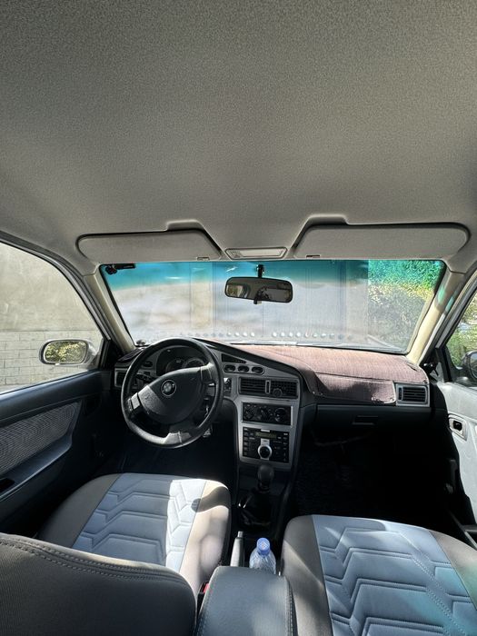 Nexia 2 donc 1.6 oq rang