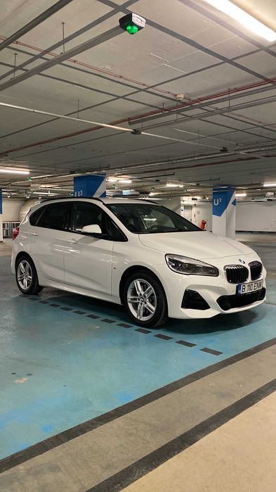 BMW 225xe active tourere, plug-in hibrid, an 2021, 83000km, tractiune integrala, M pachet, cumparata BMW Romania