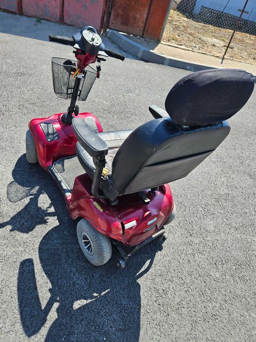 Scuter electric 4 roți Pride Mobility (Model clasic robust - Defect minor)